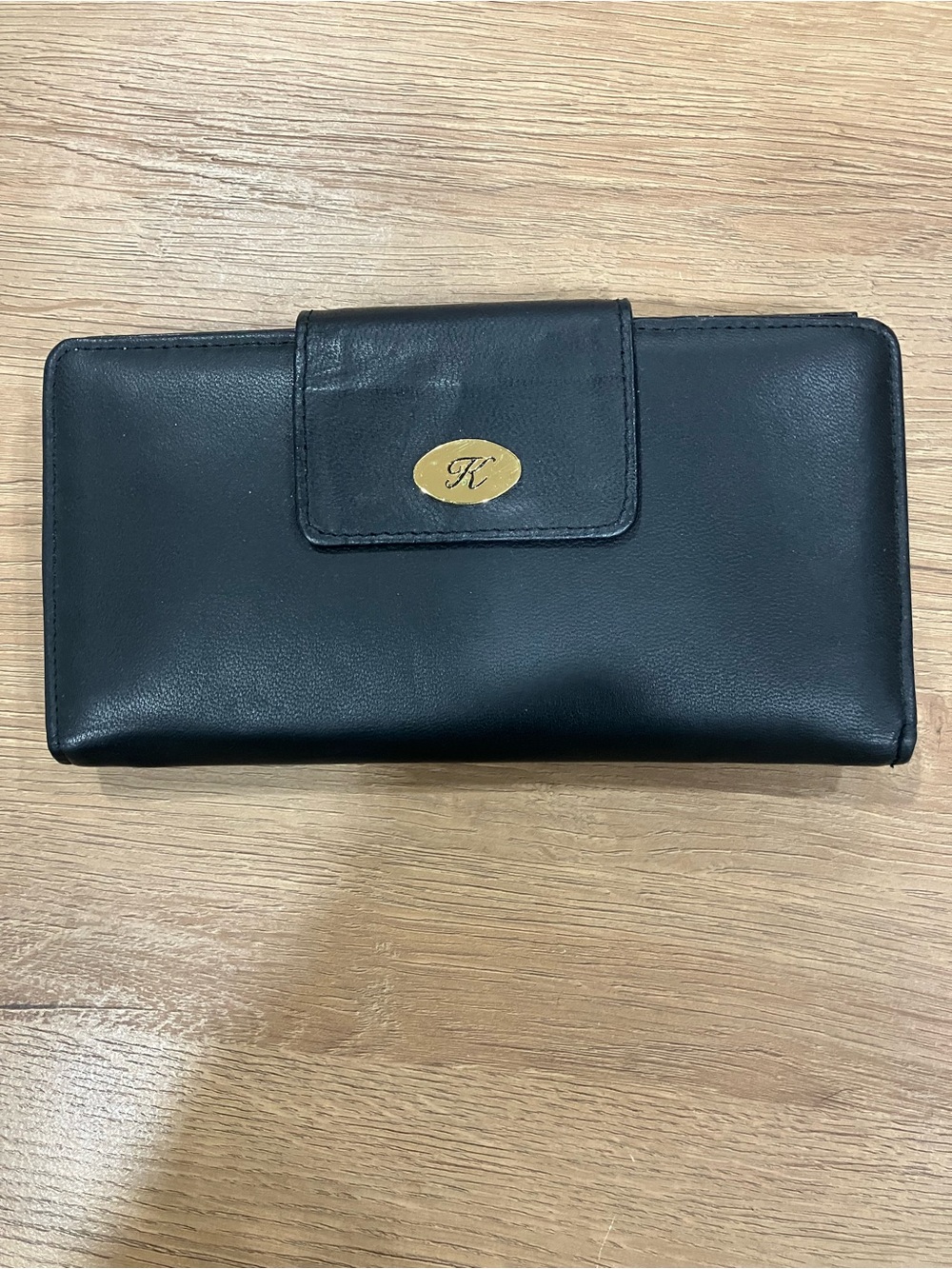 Koret Black Leather Clutch Wallet with Gold K Emblem